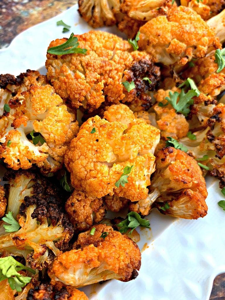 keto buffalo cauliflower wings on a white plate