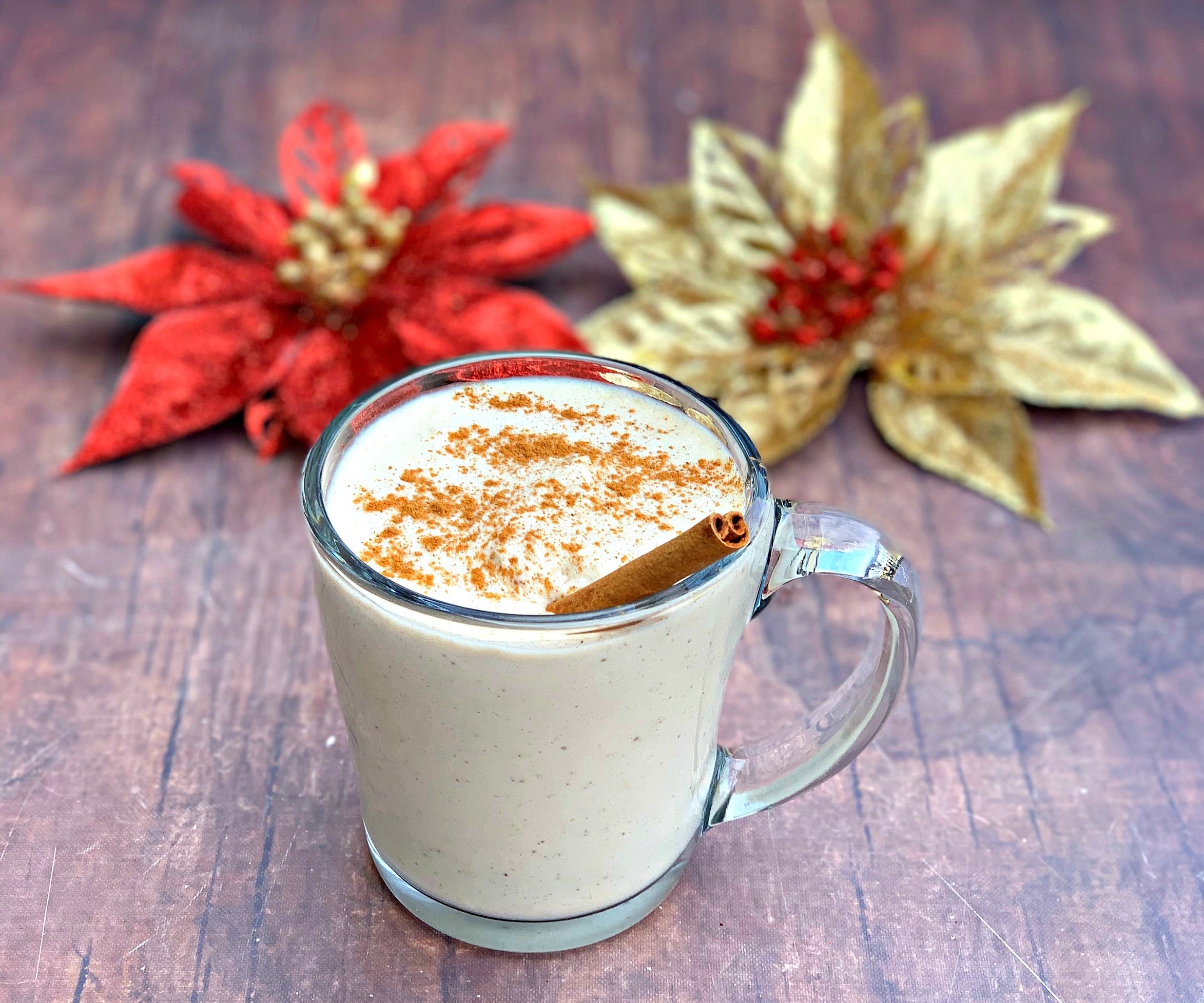 keto low carb egg nog in a mug with holiday decor in the background