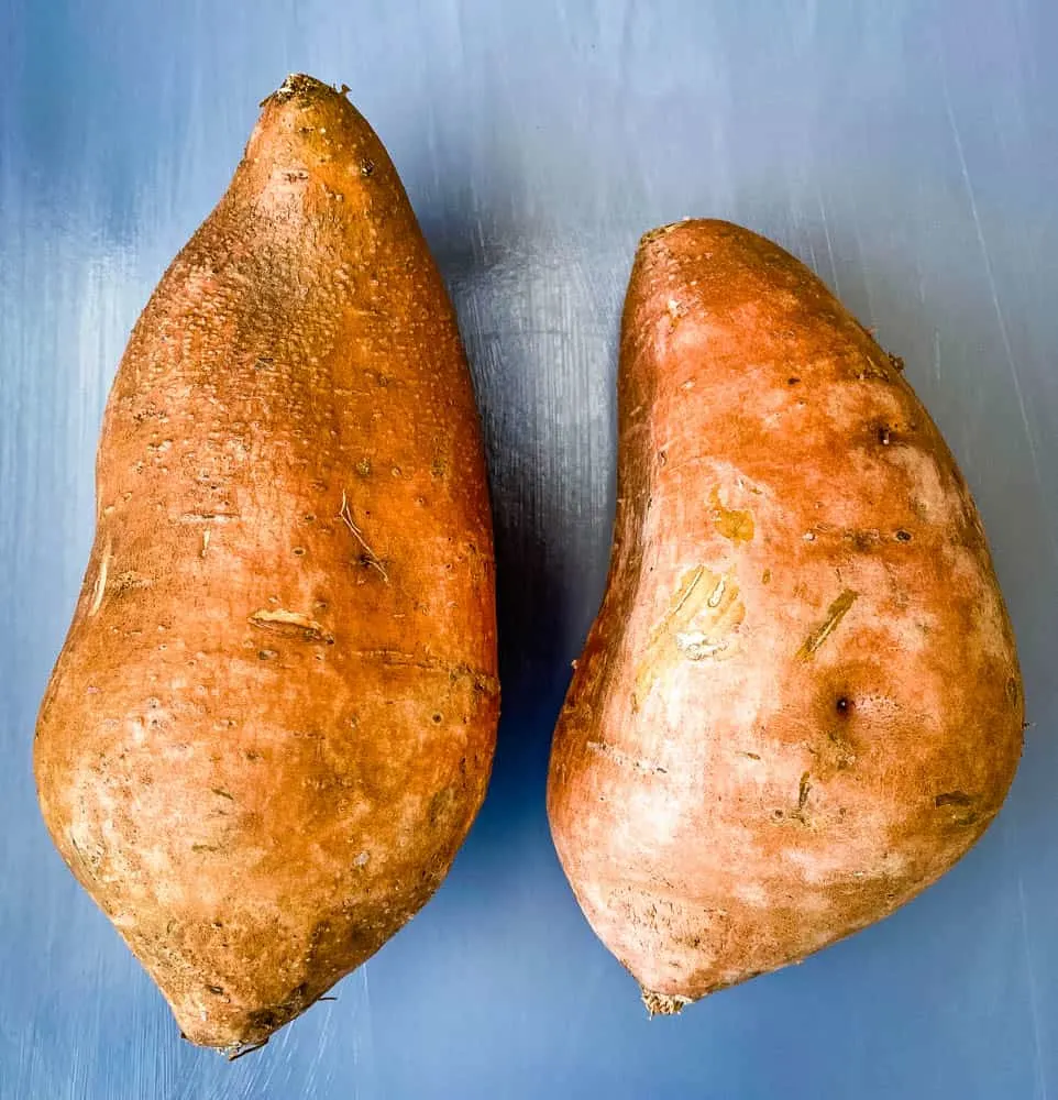 raw sweet potato on a flat surface