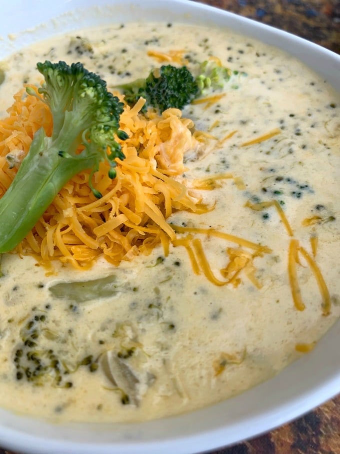 keto low carb instant pot broccoli cheddar soup in a white bowl