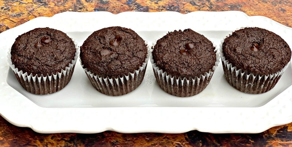 keto low carb chocolate muffins on a white plate