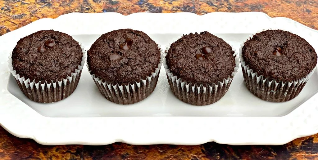 keto low carb chocolate muffins on a white plate