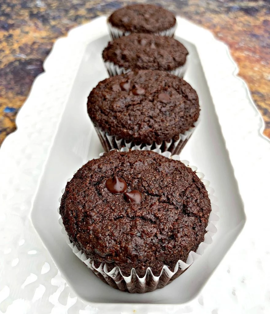 keto low carb chocolate muffins on a white plate