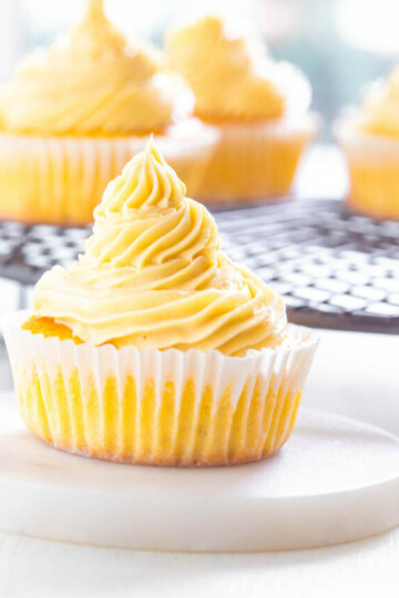 keto low carb buttercream cupcakes on a white plate