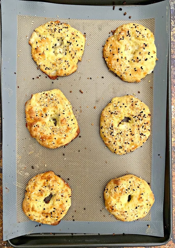 cooked keto fathead bagels on a baking mat