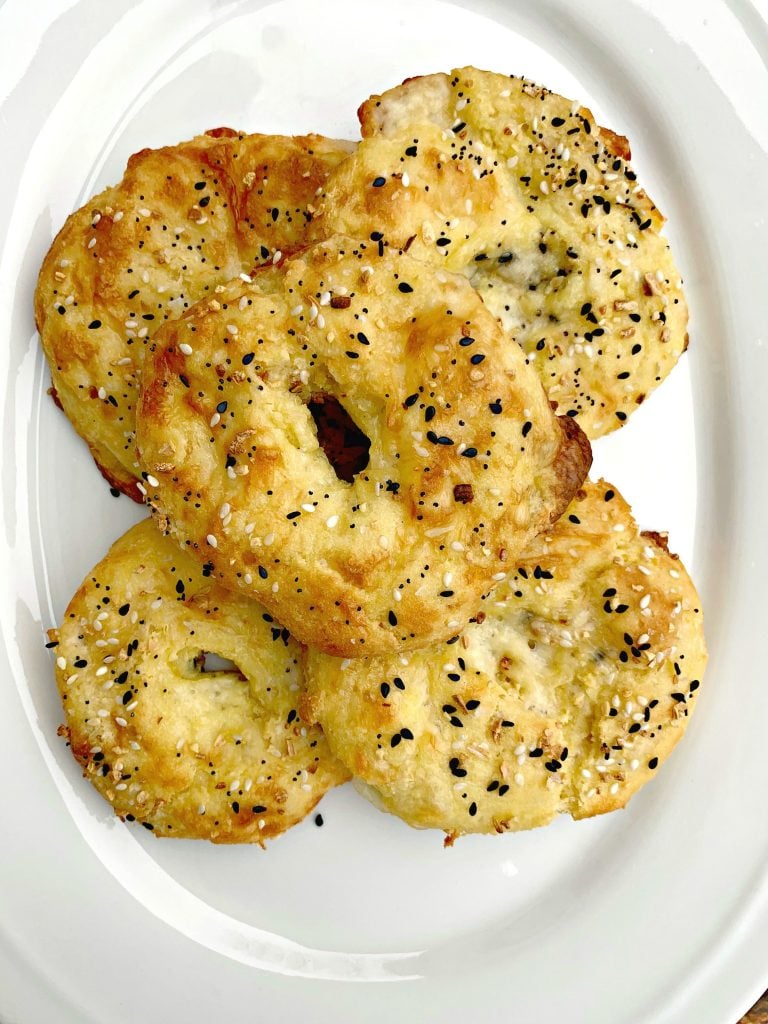 cooked keto fathead bagels on a white plate