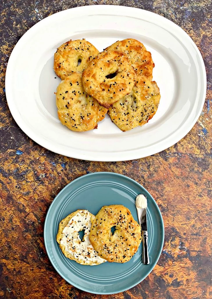 cooked keto fathead bagels on a white plate