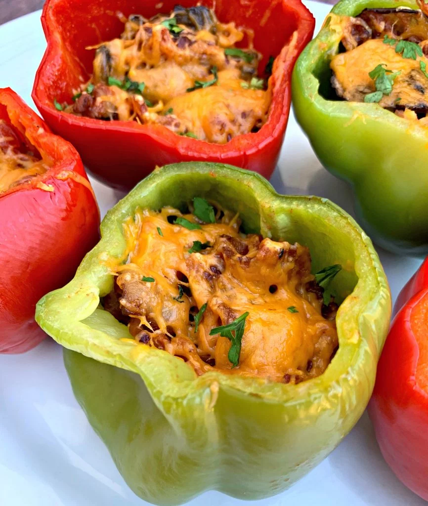 keto low carb bacon stuffed peppers on a white plate