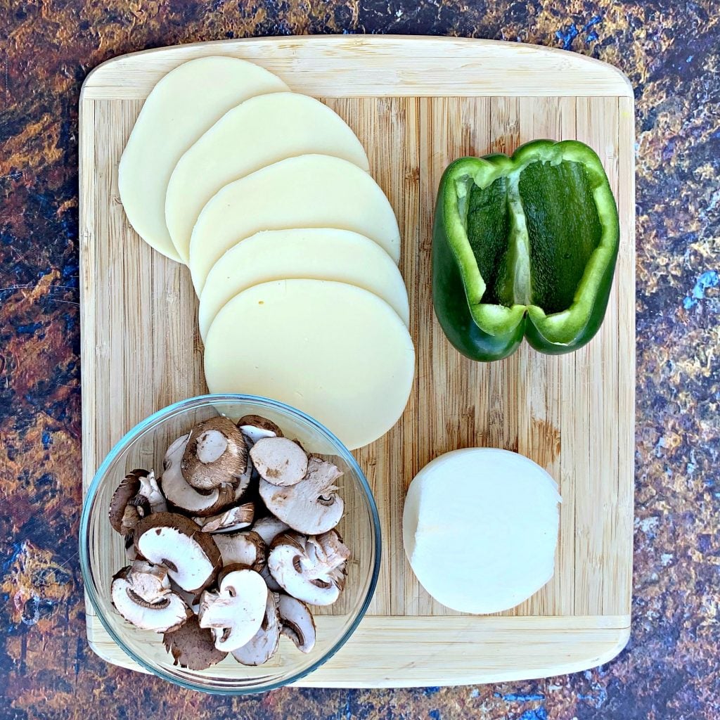 green peppers, cheese, mushrooms, and onion for keto low carb philly cheesesteak