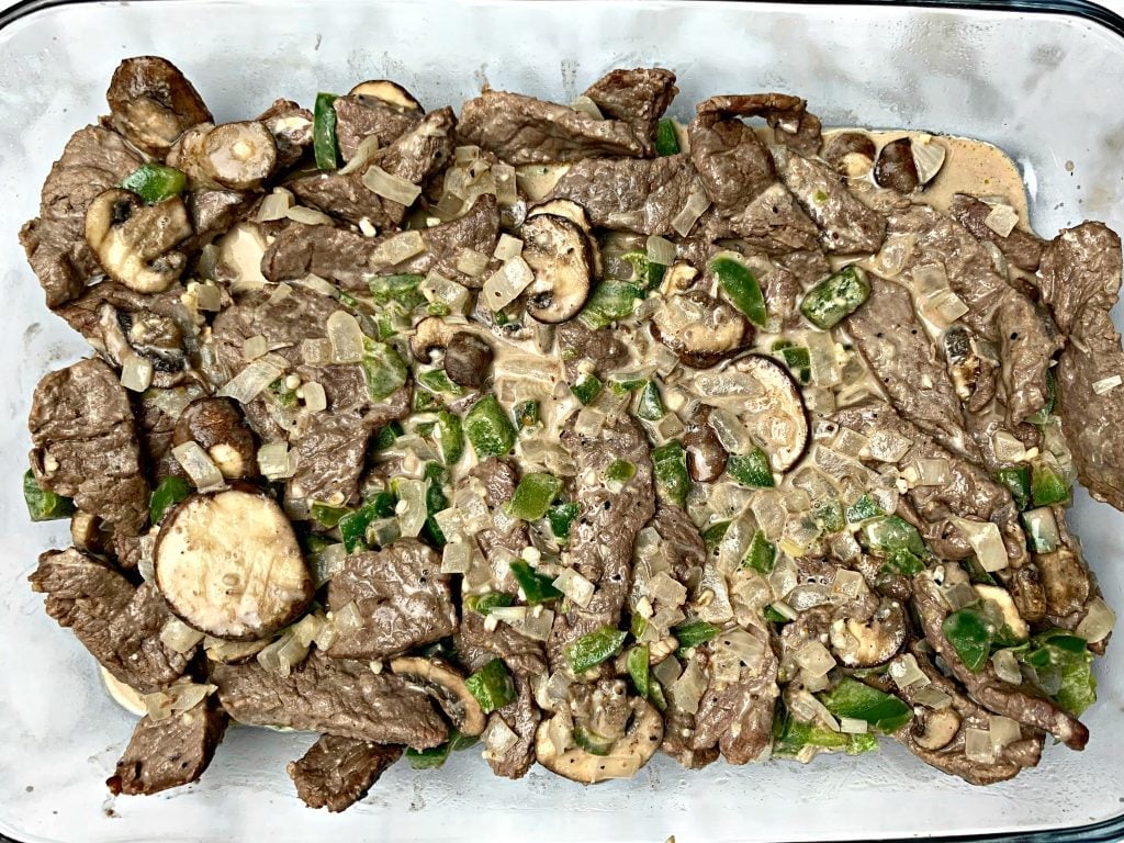 keto low carb philly cheesesteak in a glass pan