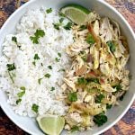 curry chicken and jasmine rice in a white bowl