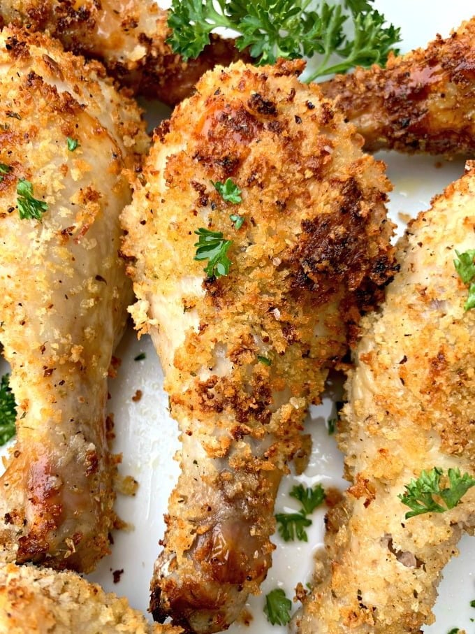 air fryer chicken drumsticks on a white plate