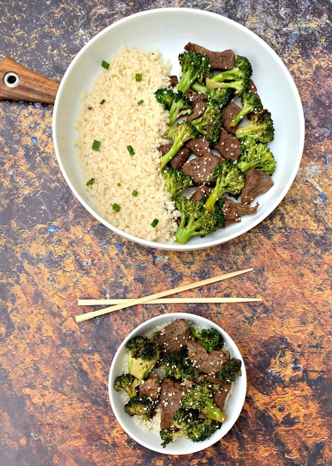 keto beef and broccoli with cauliflower rice in a white bowl