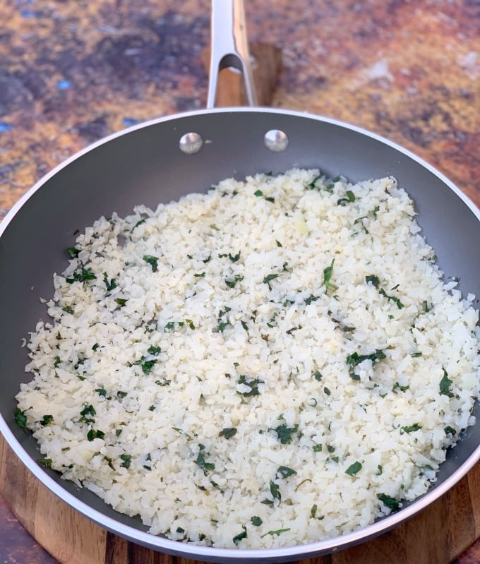 cilantro lime cauliflower rice in a skillet