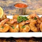 keto low carb breaded shrimp on a white plate
