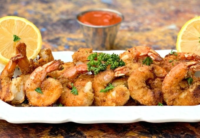 keto low carb breaded shrimp on a white plate