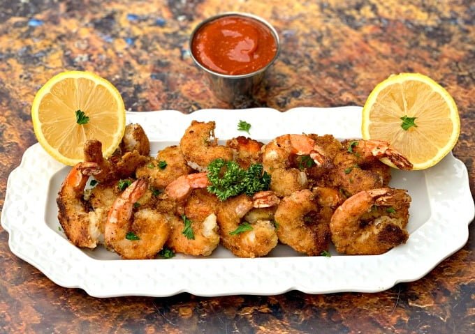 keto low carb breaded shrimp on a white plate