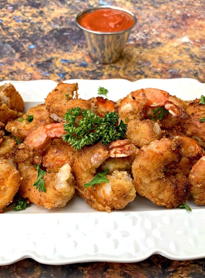keto low carb breaded shrimp on a white plate