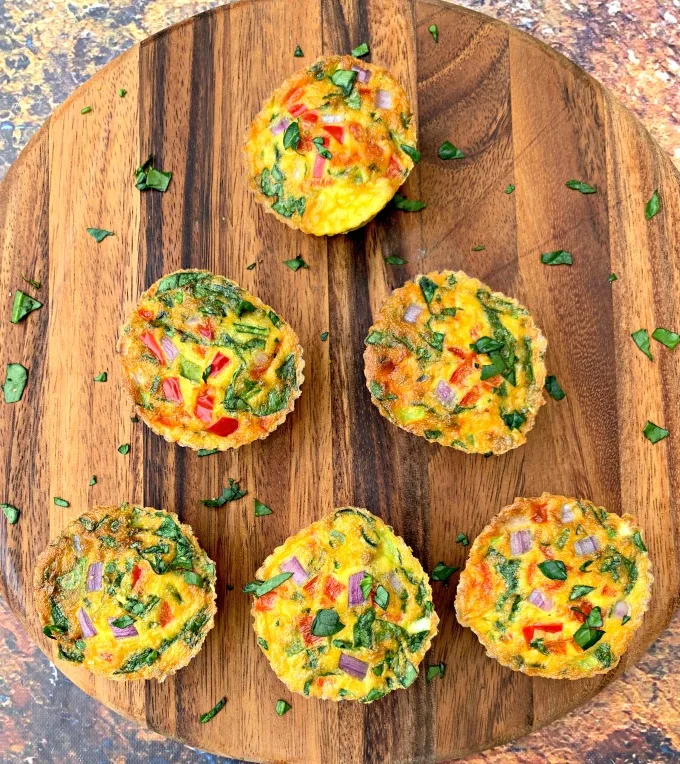 keto low carb air fryer egg bites cups on a brown plate