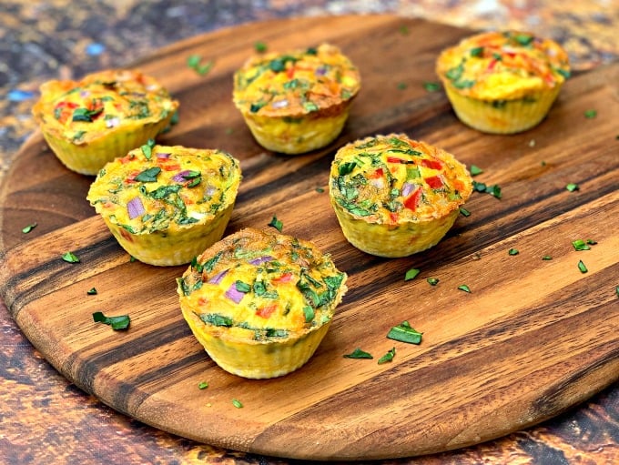 keto low carb air fryer egg bites cups on a brown plate