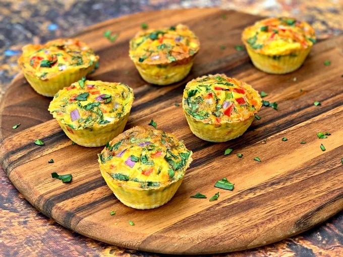 keto low carb air fryer egg bites cups on a brown plate