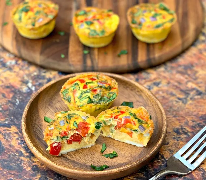 keto low carb air fryer egg bites cups on a brown plate
