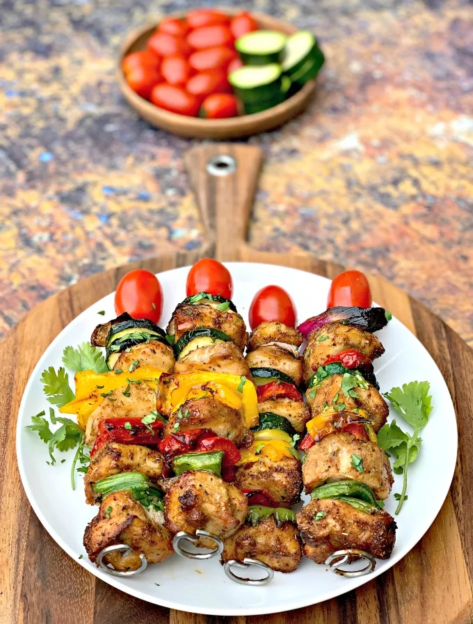 air fryer grilled chicken kebobs on a white plate