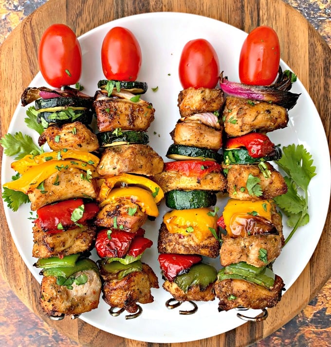 air fryer grilled chicken kebobs on a white plate
