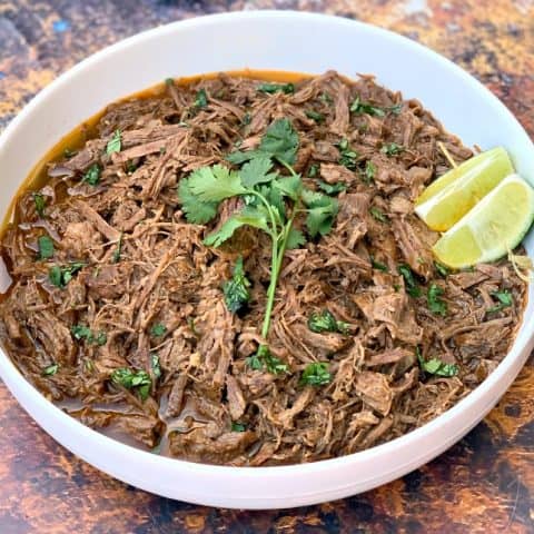 instant pot keto low carb barbacoa beef in a white bowl