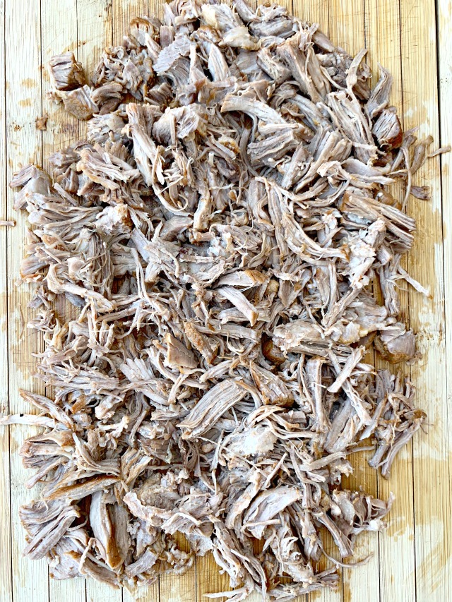 instant pot pulled pork on a cutting board