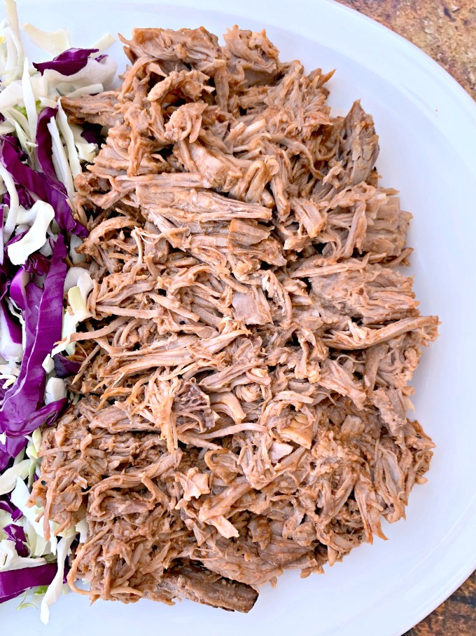 instant pot pulled pork on a white plate