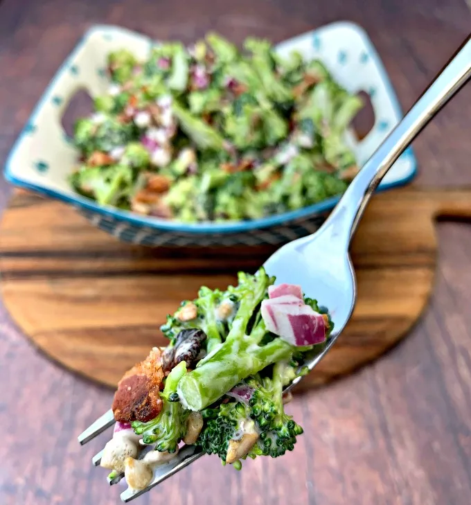 keto low carb broccoli salad with bacon held on a forkr