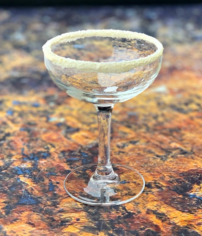 martini glass lined with sugar sweetener