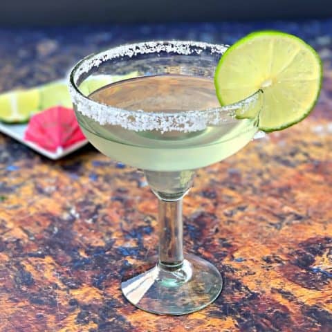 keto low carb skinny margaritas in glasses garnished with lime