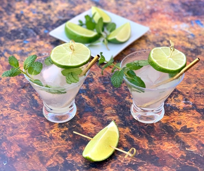 2 keto low carb mojito drink cocktail in a glass with fresh mint and fresh lime
