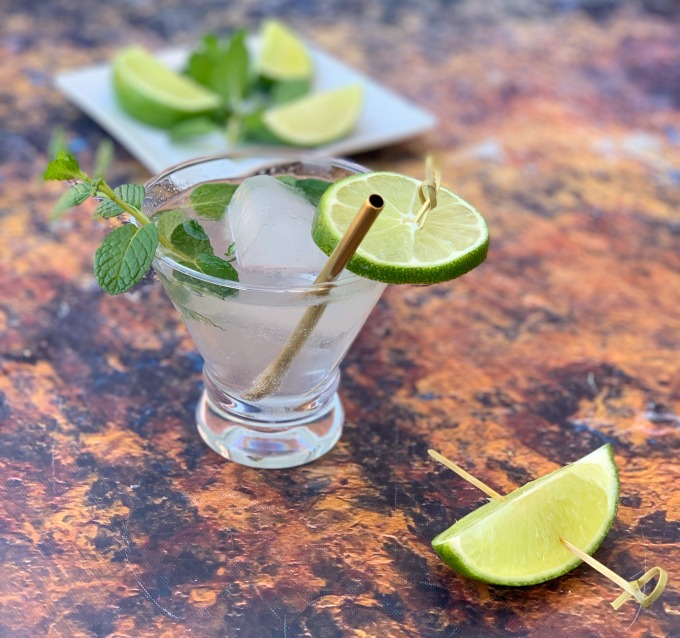 keto low carb mojito drink cocktail in a glass with fresh mint and fresh lime