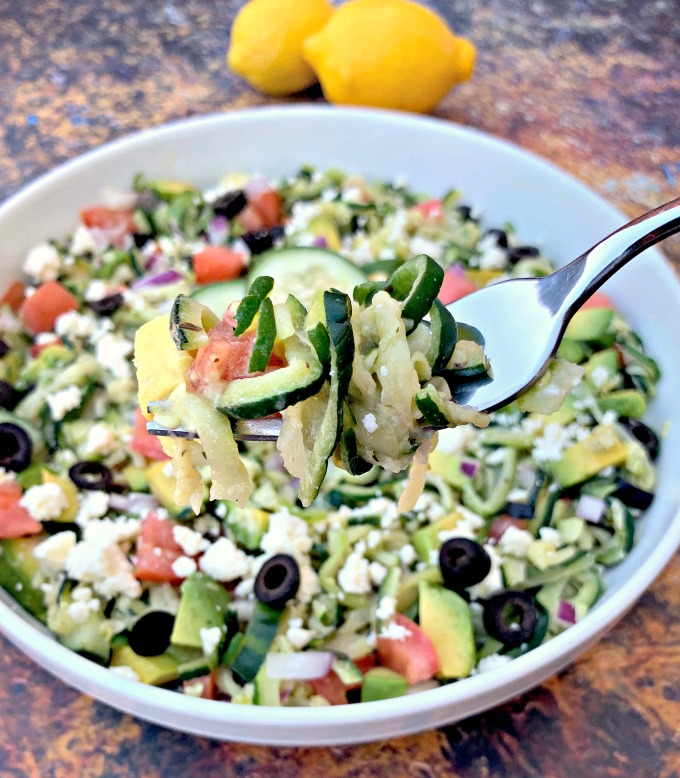 fork holding keto zucchini noodle pasta salad