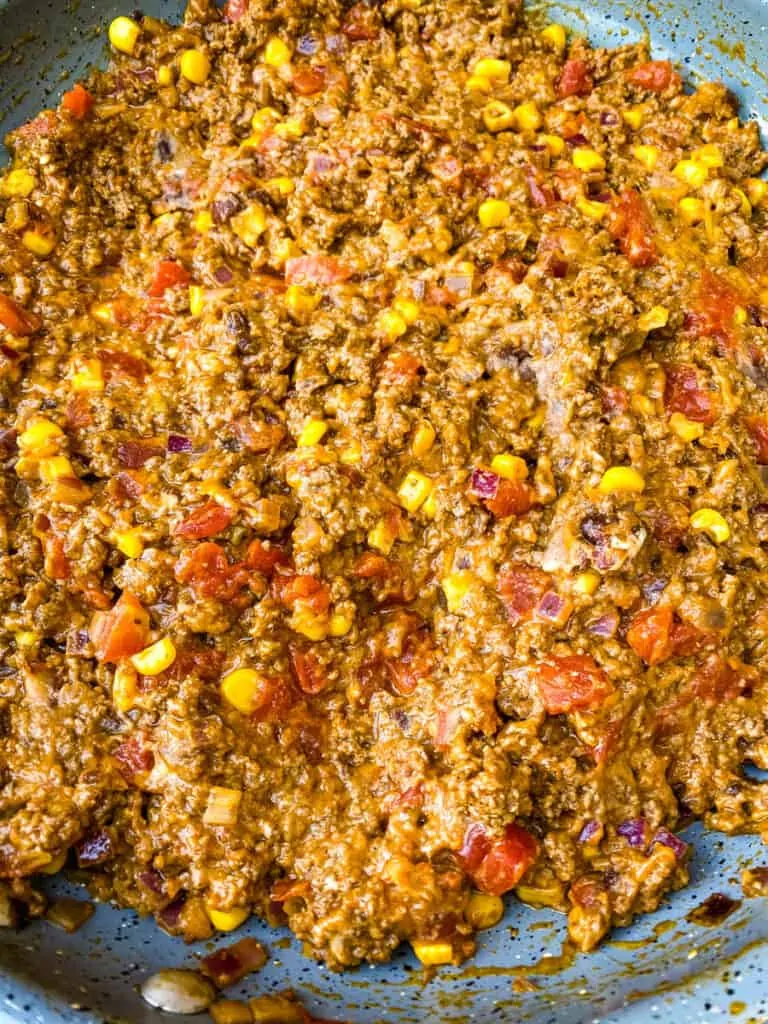 cook taco ground beef meat in a skillet