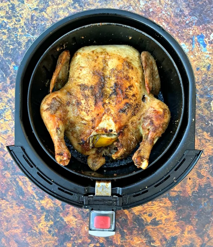 air fryer whole chicken in an air fryer basket