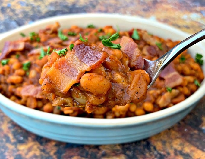 spoonful of instant pot baked beans with bacon
