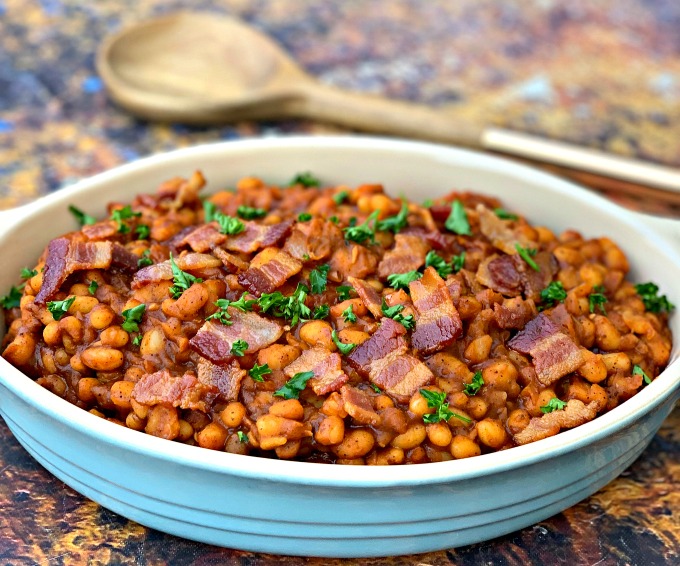 instant pot baked beans with bacon in a blue bowl