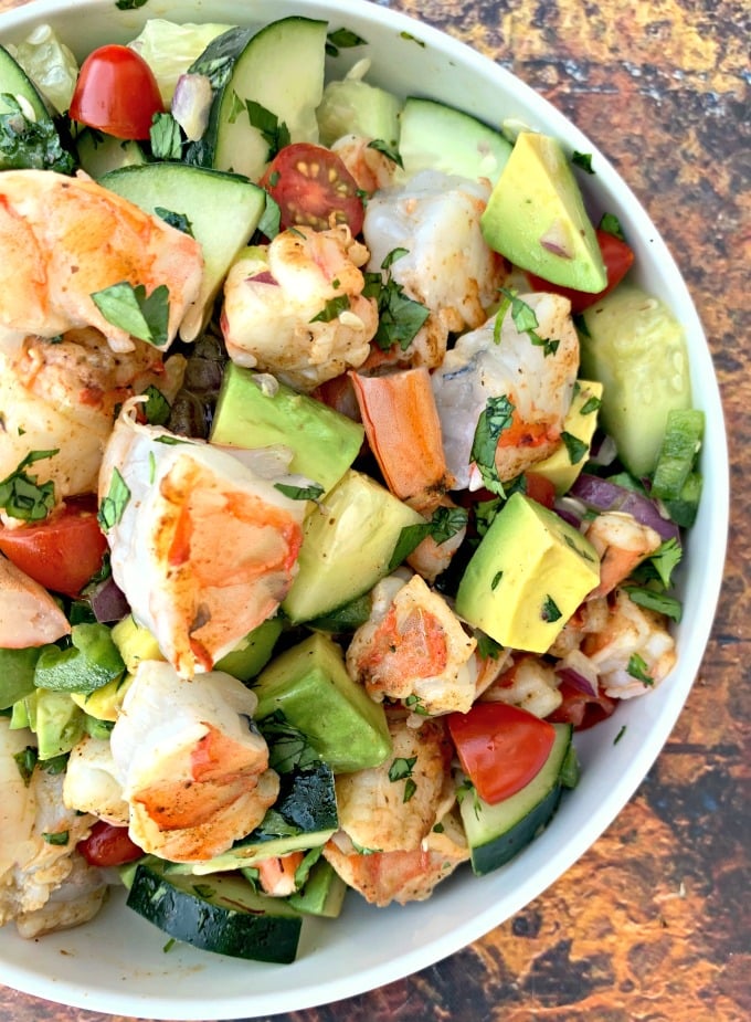 keto low carb shrimp avocado ceviche salad in a white bowl