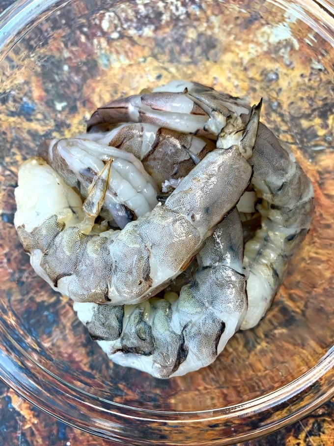 raw shrimp in a glass bowl