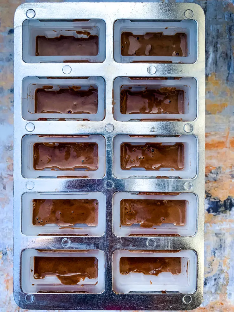 keto fudge popsicle mix in a popsicle mold