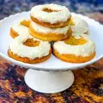 keto low carb glazed donuts on a white dessert tray