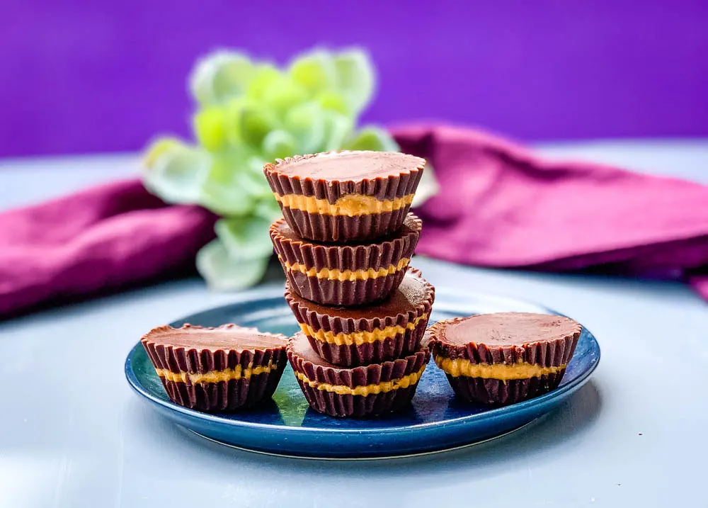 keto peanut butter cups on a blue plate