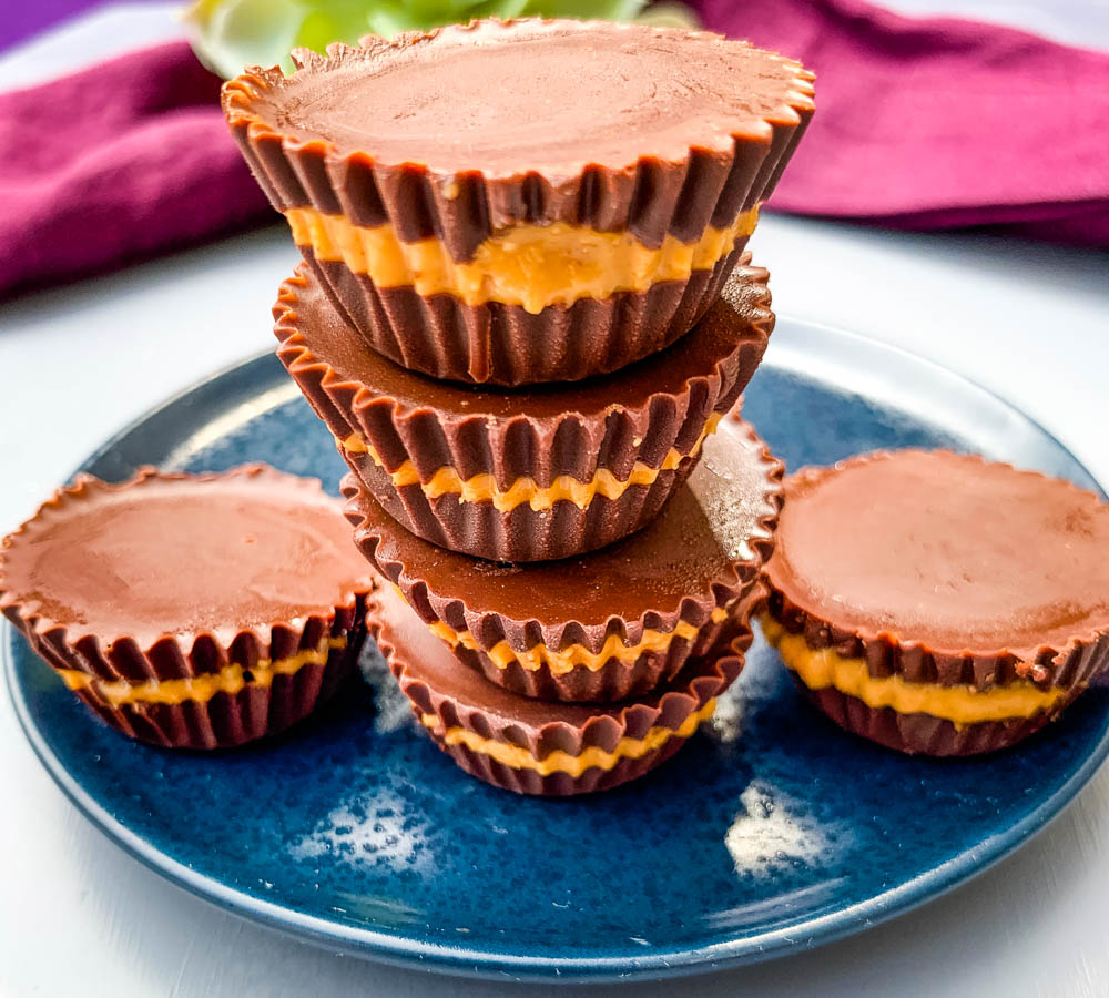 keto peanut butter cups on a blue plate