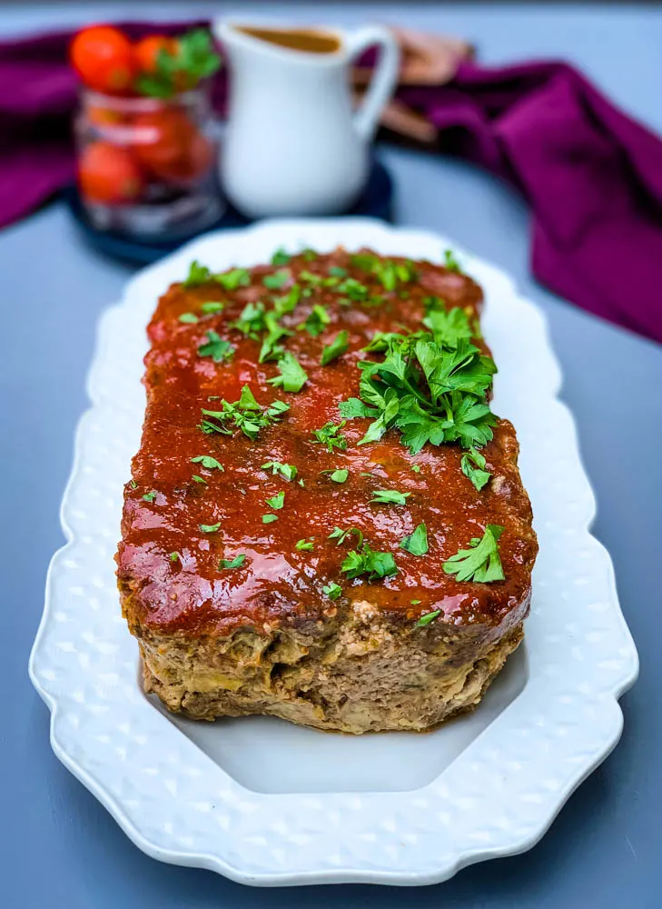 keto low carb meatloaf on a white serving plate