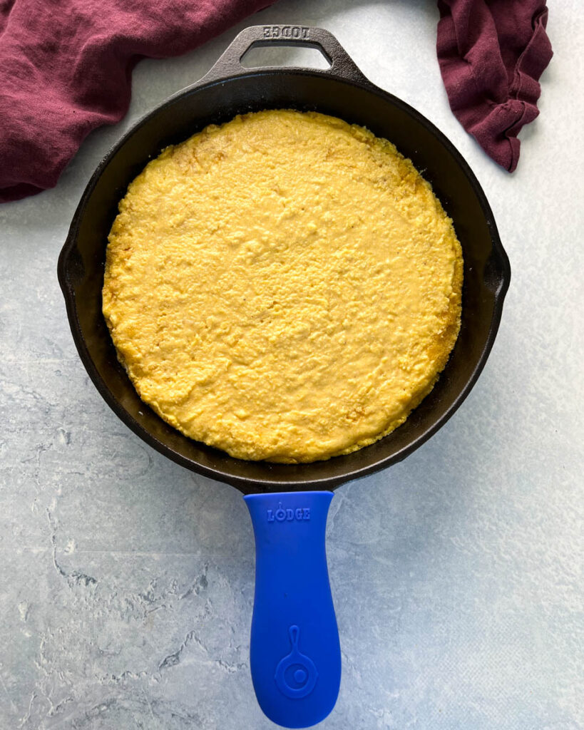 Southern unbaked cornbread in a cast iron skillet