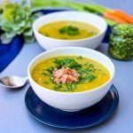 instant pot split pea soup in a white bowl on a blue plate